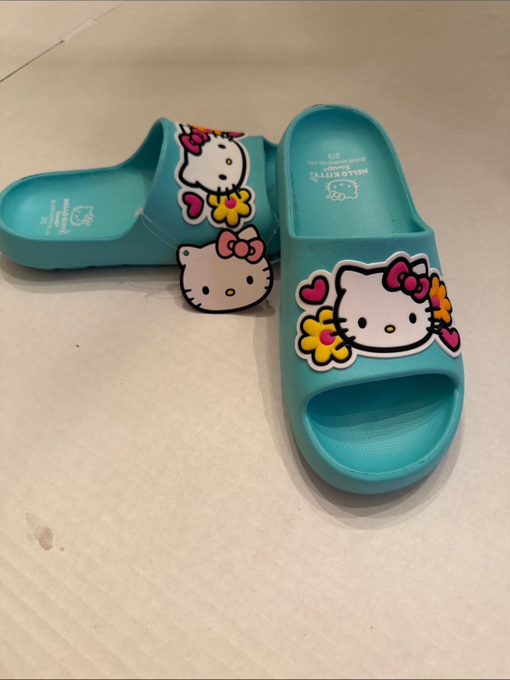 Sanrio Hello Kitty Turquoise Slide Sandals with Floral Applique NWT size 2/3